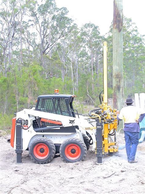 skid steer attachment rock|drilling rig attachments for bobcat.